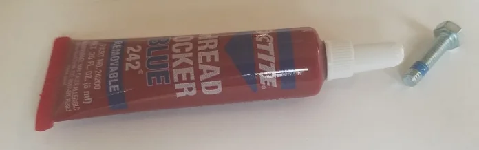 thread adhesive applied to a bolt
