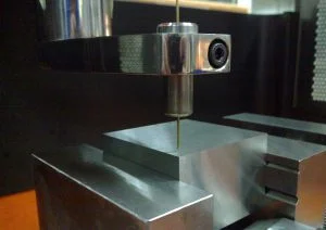 Small hole-drilling EDM machine - Fictiv Small hole-drilling EDM machine