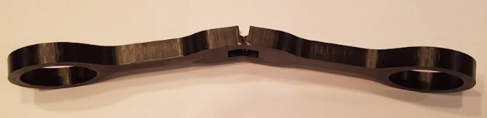 plastics-image03 - Fictiv plastic component after being loaded past its yield strength