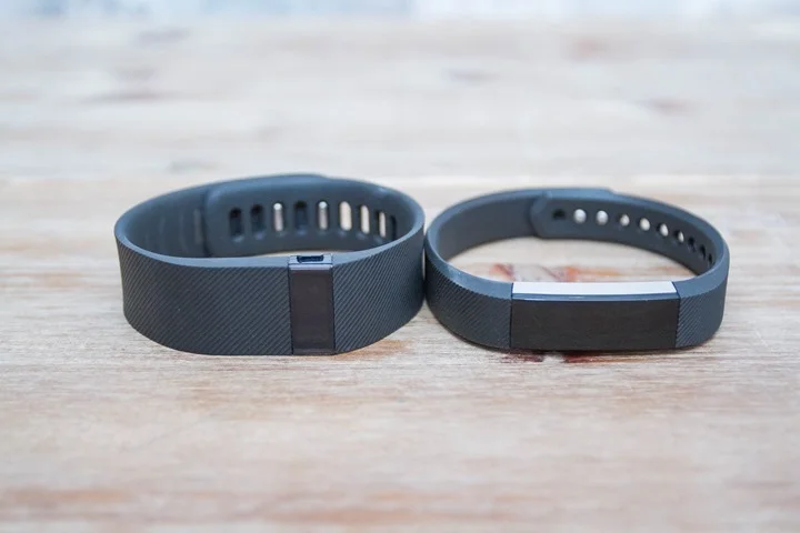 The new FitBit Alta (right) next to the FitBit Charge