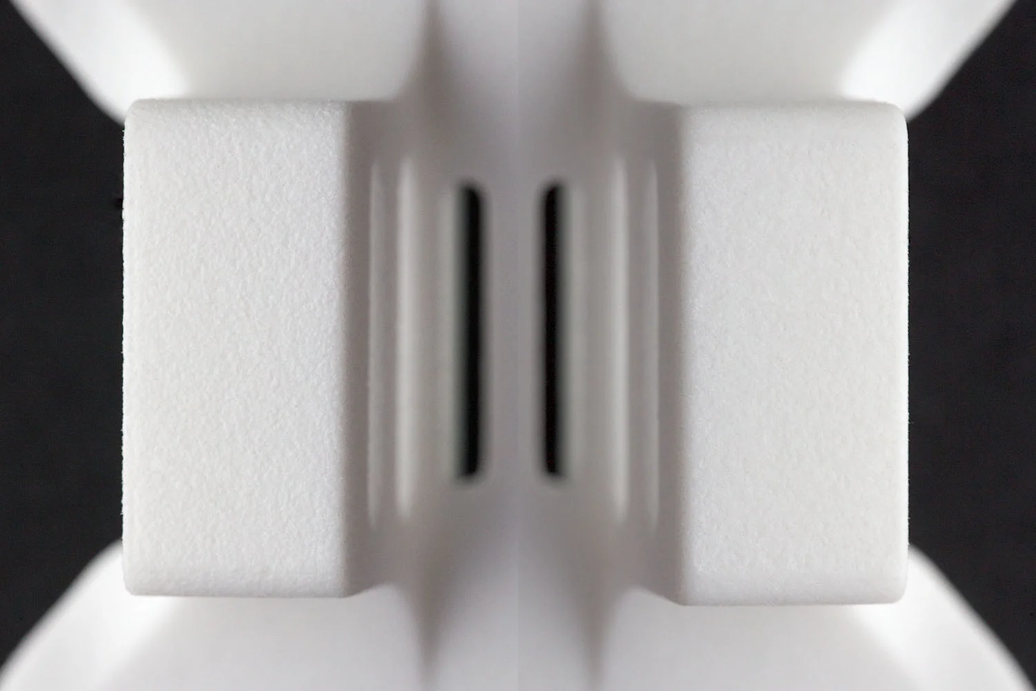 SLS-compaired-reg-to-tumble - Fictiv left: as-printed SLS Nylon, right: tumbled polished SLS Nylon