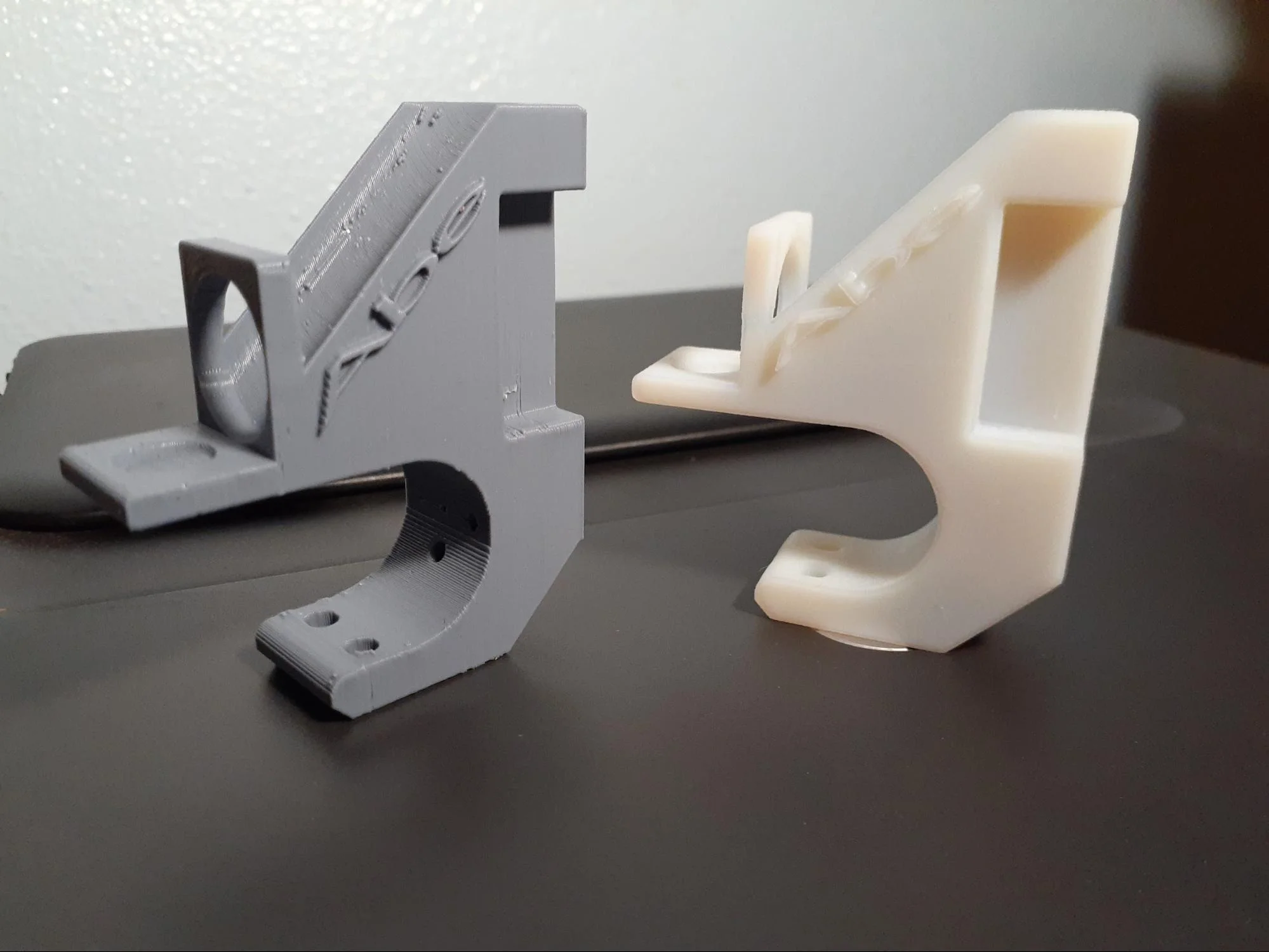 3D Printed Pencil/Pen Holders standing upright.