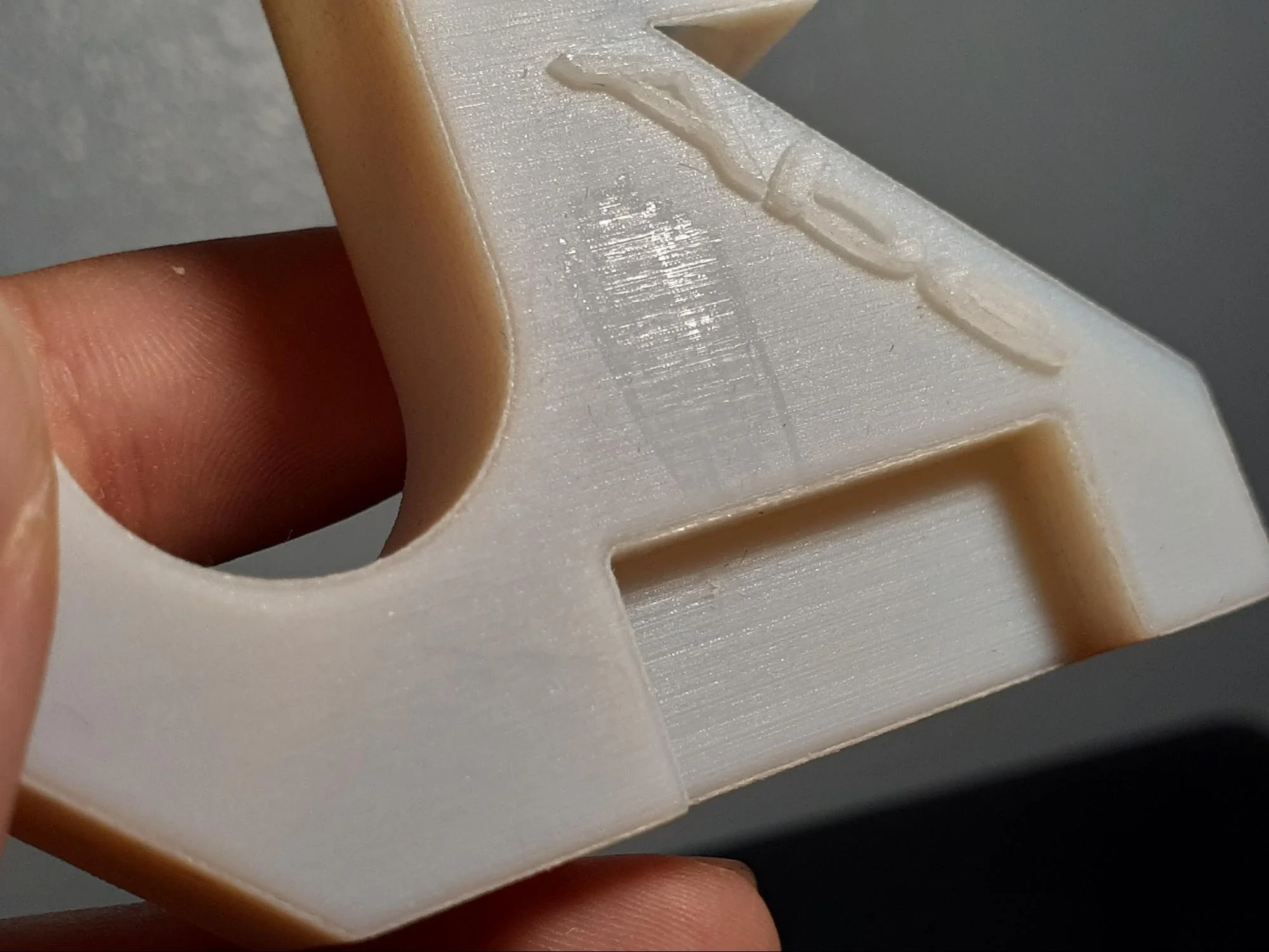 Proof of slight wear on ABS-like printed piece after performing abrasion test.