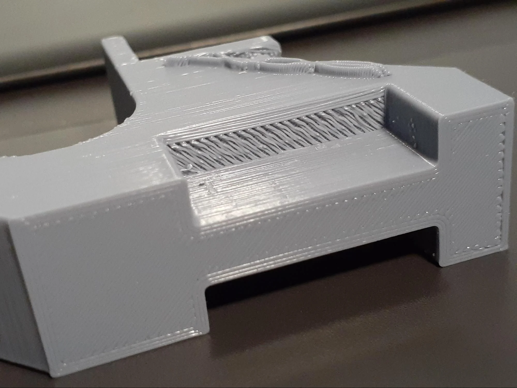 Showing rough areas where support material was needed when printing the PLA piece