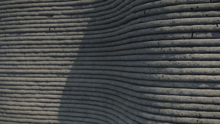 3D printed concrete wall, similar to the ones utilized to 3D print schools