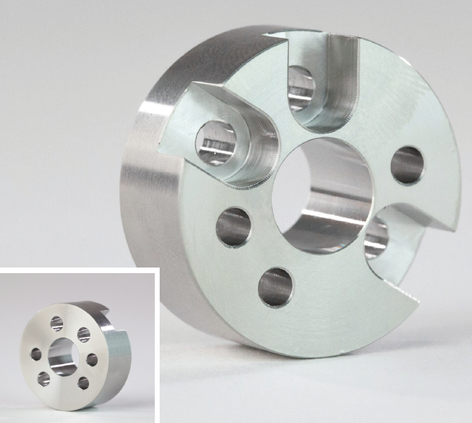 Basic of Finishing CNC Machined Parts 4 A circular metal part with holes drilled in it, finished using passivation