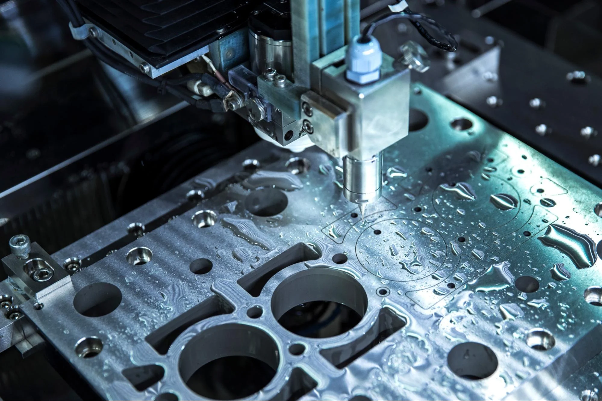 CNC workholding - Fictiv A metal part in a CNC machine