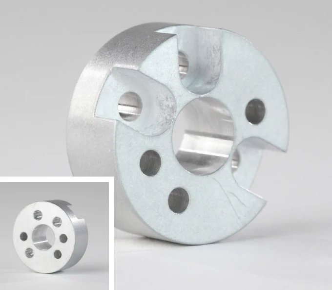 tumbling - Fictiv A circular metal part with holes drilled in it, finished using tumbling
