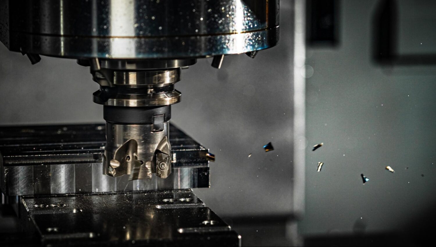 shell mill cutting chips from block of metal