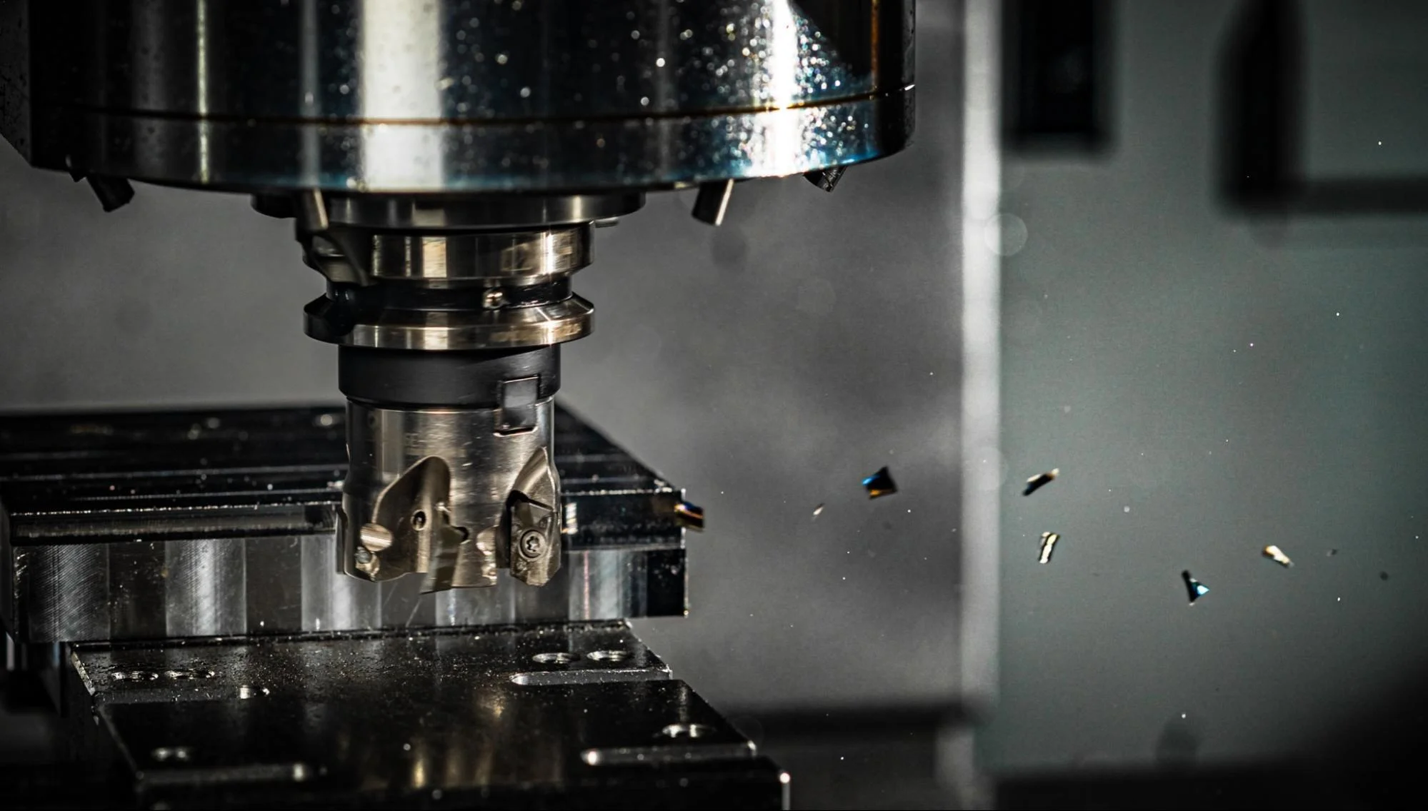 CNC shell mill - Fictiv shell mill cutting chips from block of metal