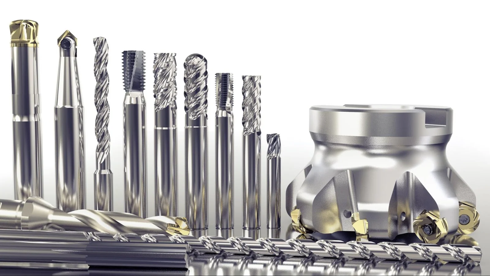 CNC machine tools lined up against a white background