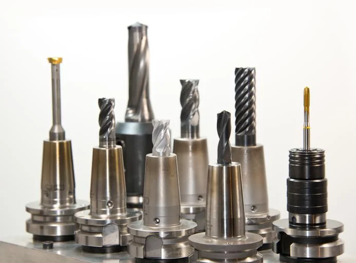 a rack of cnc machine tools ready to be loaded into the machine