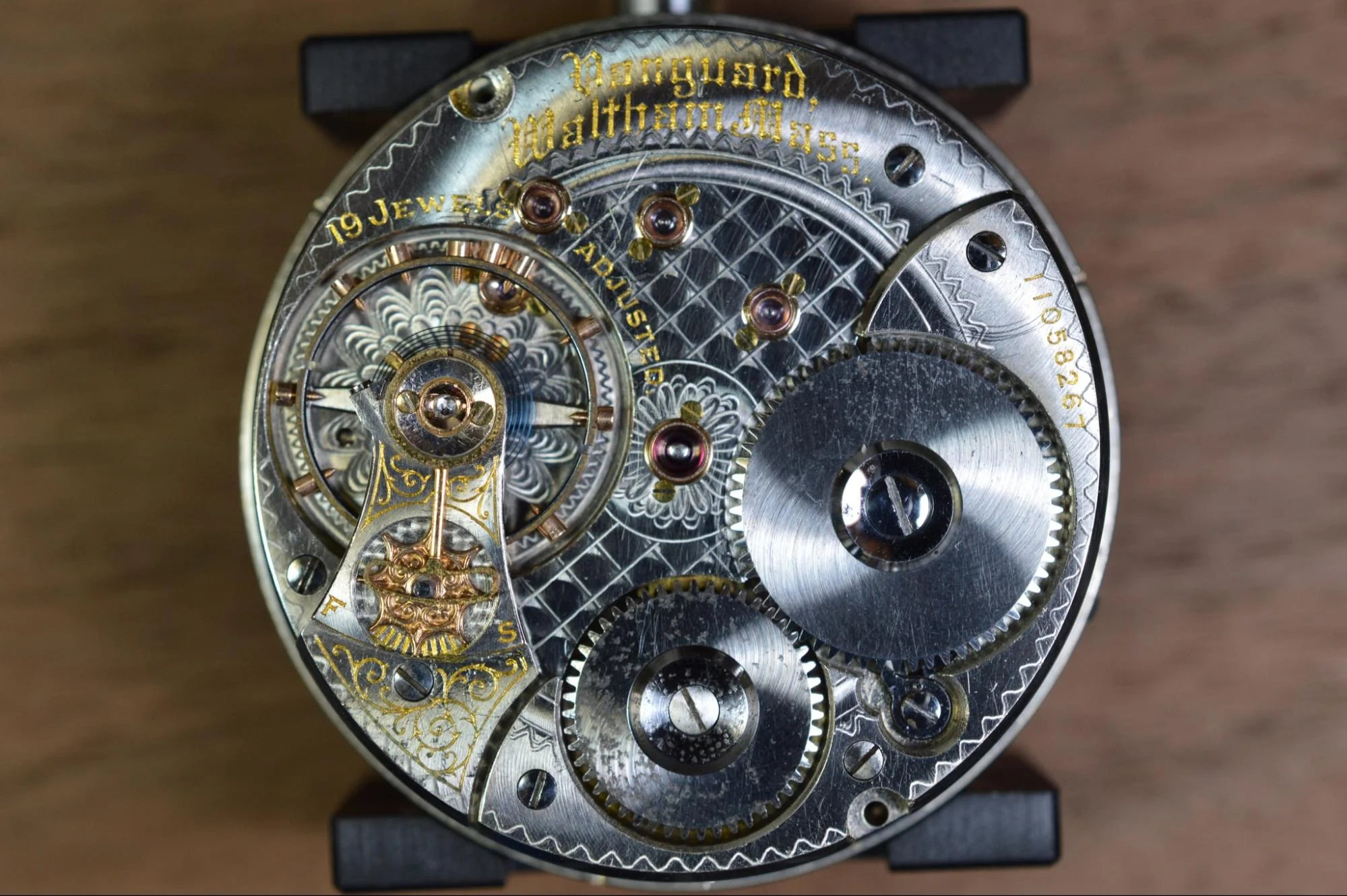 watch gears - Fictiv the inside of a watch with the gears and engraving