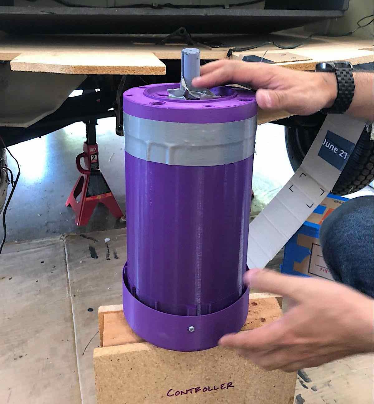 purple 3d printed mockup of an electric motor