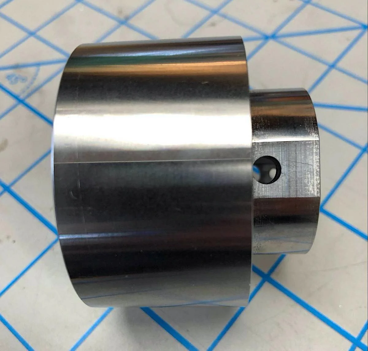image of a steel cnc machined drive coupler side view