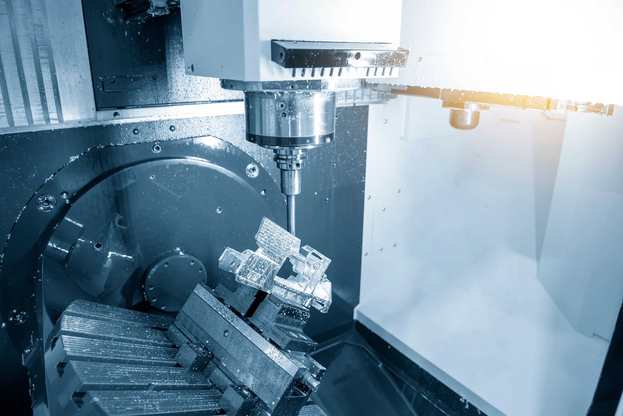 The,5,Axis,Cnc,Milling,Machine,Cutting,The,Automotive,Parts - Fictiv A 5 axis CNC machine in action