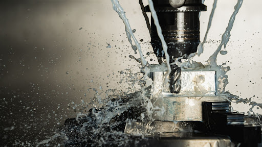 CNC machining of aluminum Photo by Daniel Smyth on Unsplash