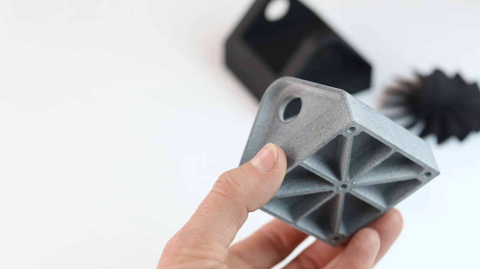 Multi Jet Fusion 3D Printed Part with Holes for Fastener Installation - Fictiv Multi Jet Fusion 3D Printed Part with Holes for Fastener Installation