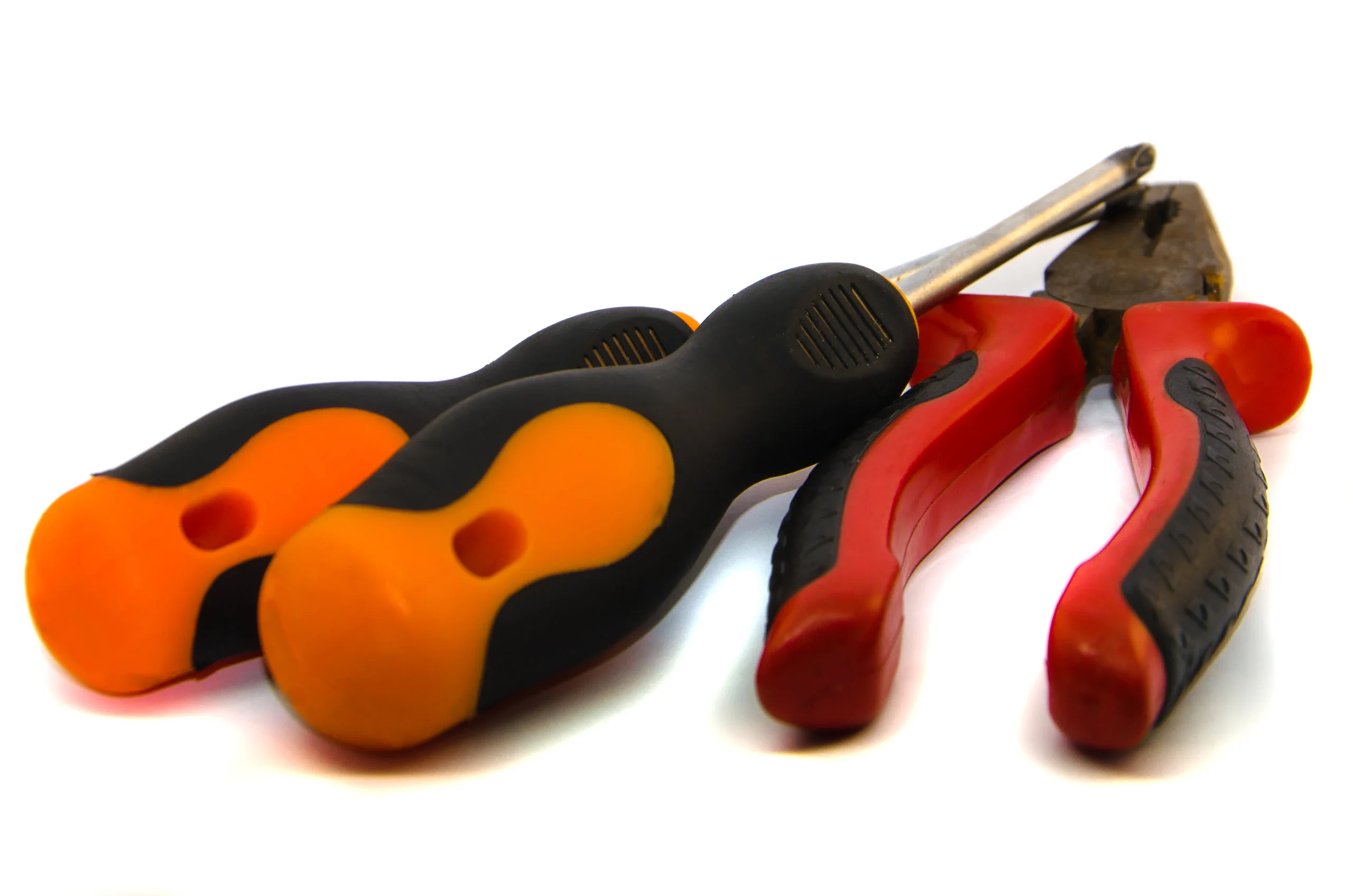 Injection molding overmolded handles for hand tools