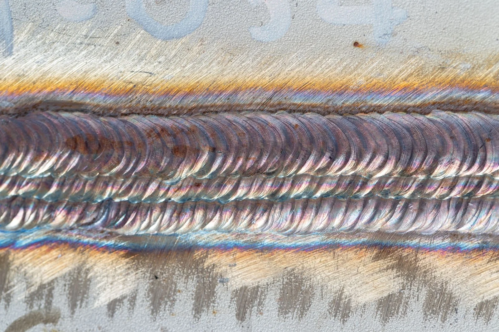 Arc-welded - Fictiv Arc welded stainless steel showing heat affected zone