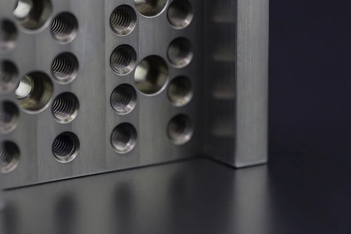 CNC-Materials_1018-_Steel_5349 - Fictiv Complex Fictiv part with numerous holes
