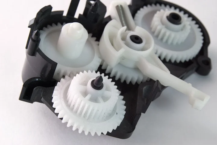 white-plastic-spur-gears-connected-complex - Fictiv Durometer and Harder Materials