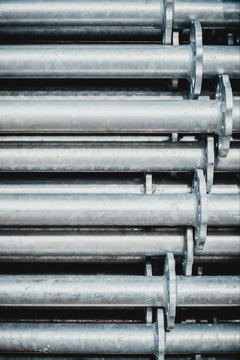 Oxidized metal tubing Photo by Bernard Hermant on Unsplash