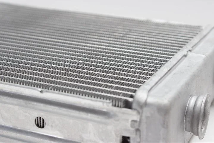 aluminum heat exchanger with aluminum cast collectors