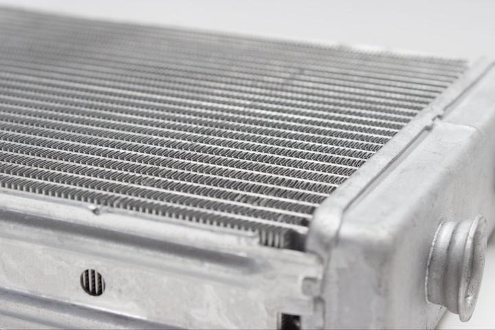 aluminum heat exchanger with aluminum cast collectors