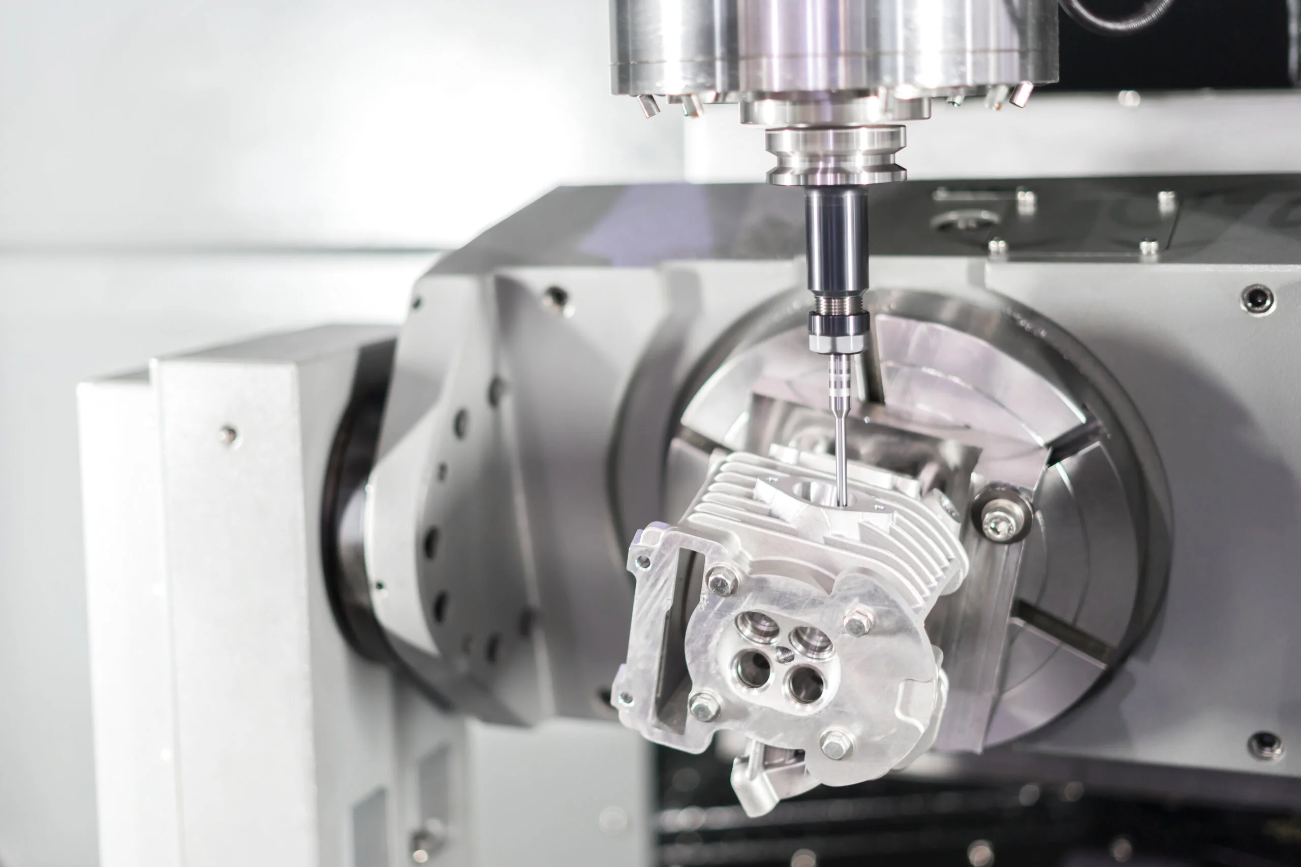 High precision CNC machining center 5 axis working, operator mac - Fictiv CNC machining