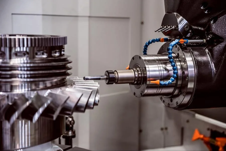A CNC milling machine cutting complex geometries - Fictiv A CNC milling machine cutting complex geometries