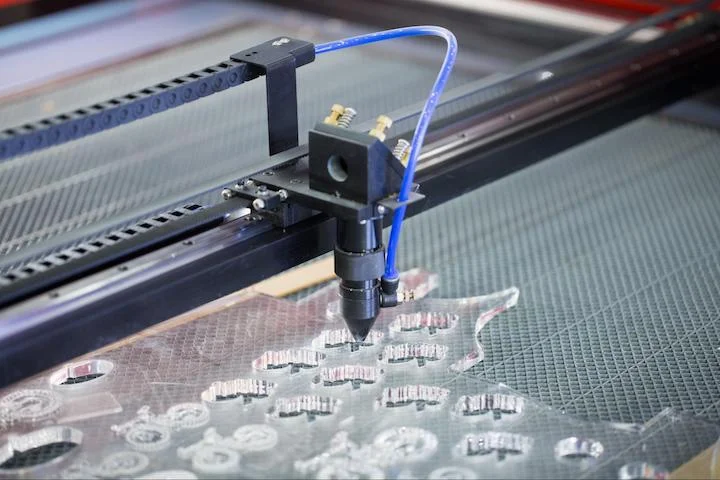 A CNC router cutting an acrylic sheet - Fictiv A CNC router cutting an acrylic sheet