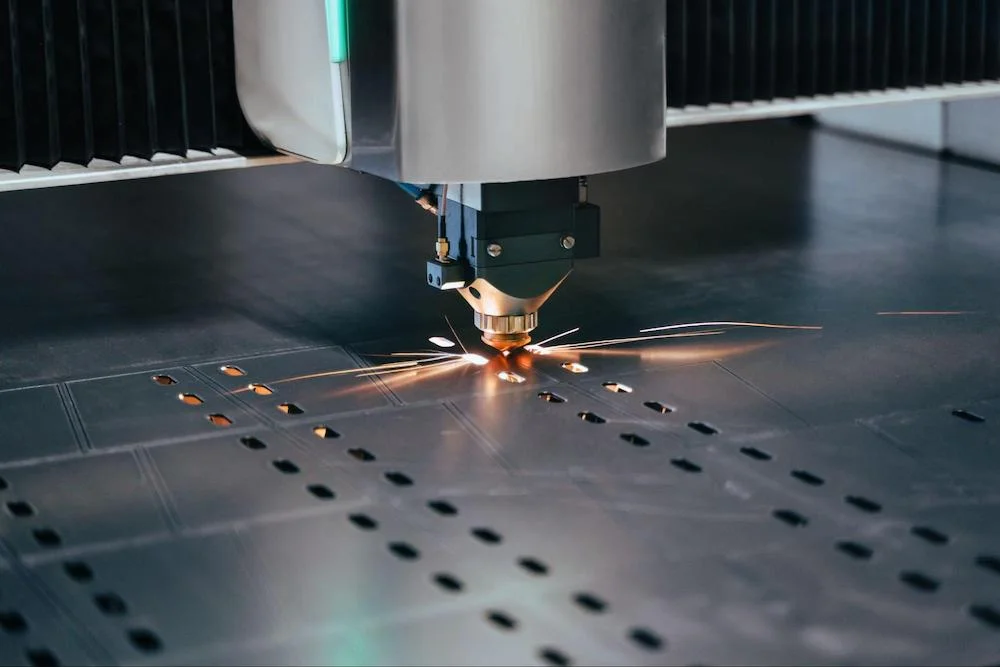 Laser cutting sheet metal in action