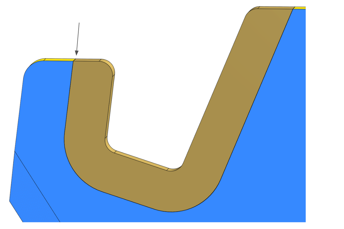 A sharp corner where the substrate meets the overmold can result in delamination.