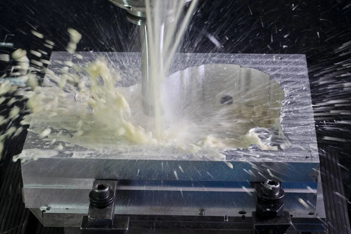 Choosing the proper cutting fluids and coolants is critical for optimal CNC machining performance.