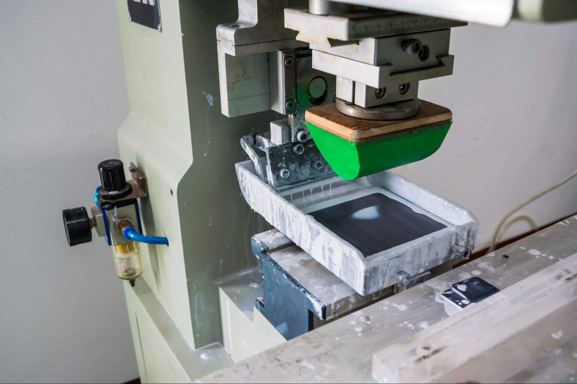 Pad printing machines are used to print on various part surfaces.