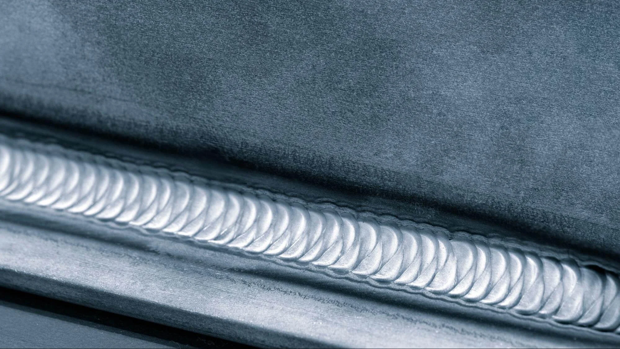 sheet metal seam - Fictiv A welding seam on an angled sheet metal joint