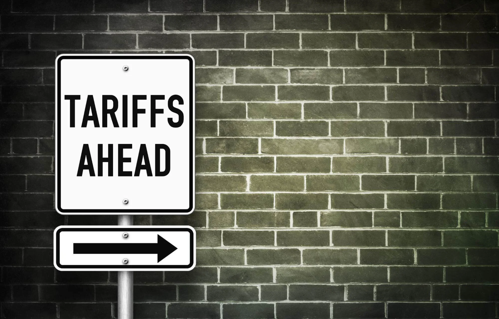 tariffs sign - Fictiv Tariffs and changes lie ahead for global manufacturing.