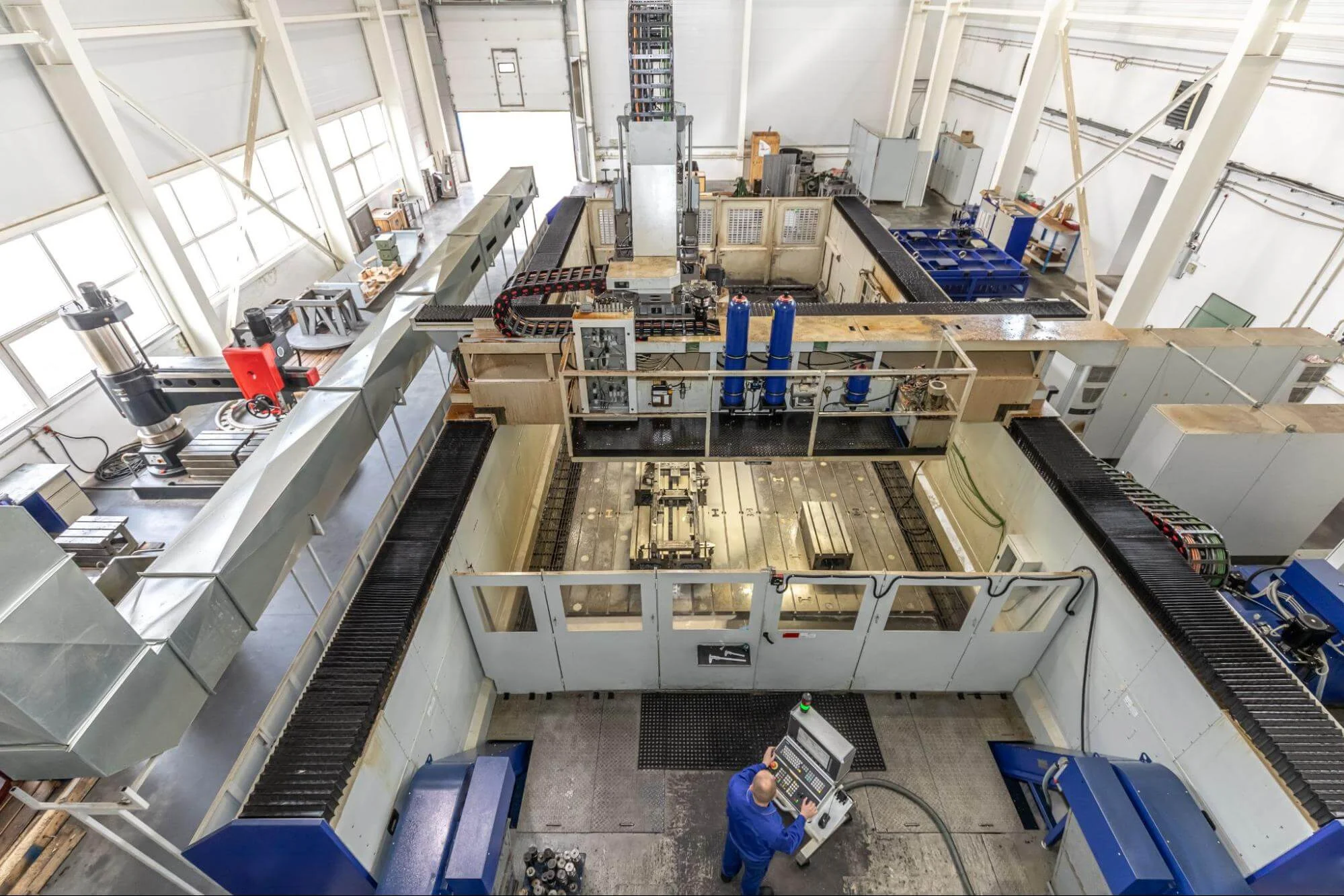 large cnc machines - Fictiv Large-format CNC machines in a factory.