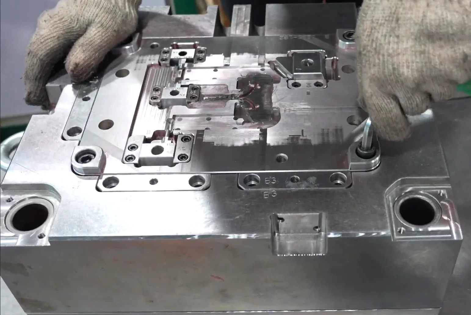Components of our injection mold being assembled