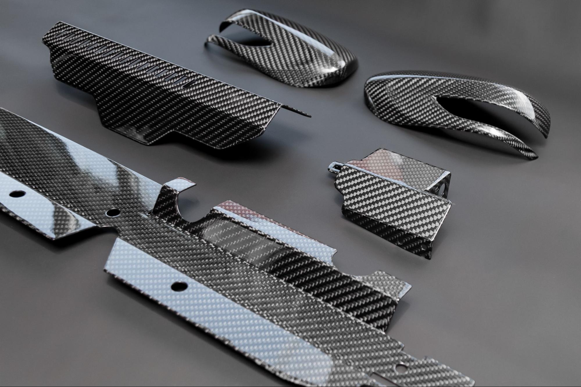 Car exterior components made from carbon fiber composites.