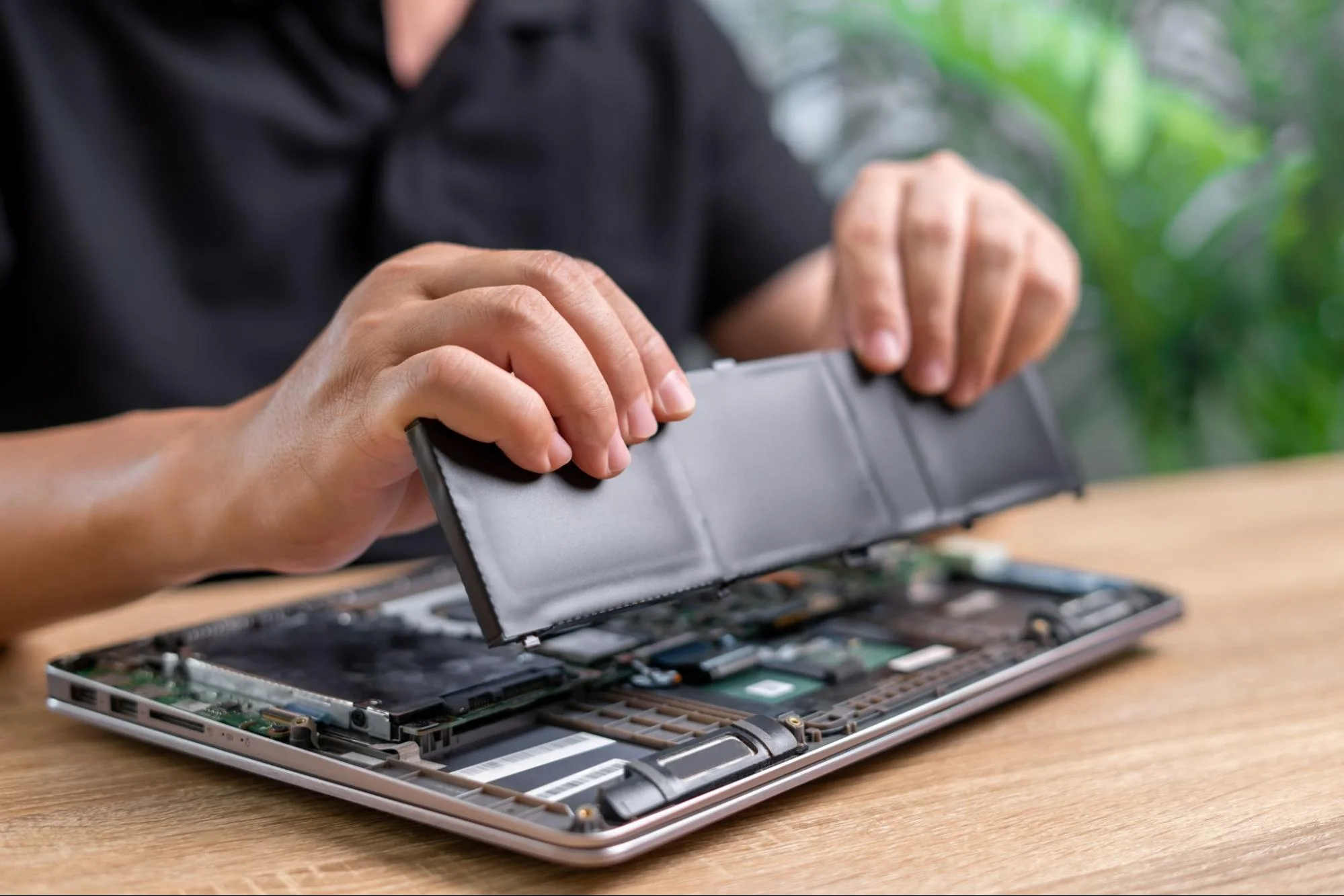 design-for-service-blog-img-2 - Fictiv Laptop being serviced for battery replacement.
