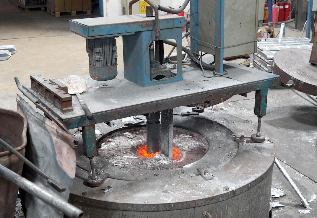 Molten metal - Fictiv Molten metal undergoing degassing prior to casting