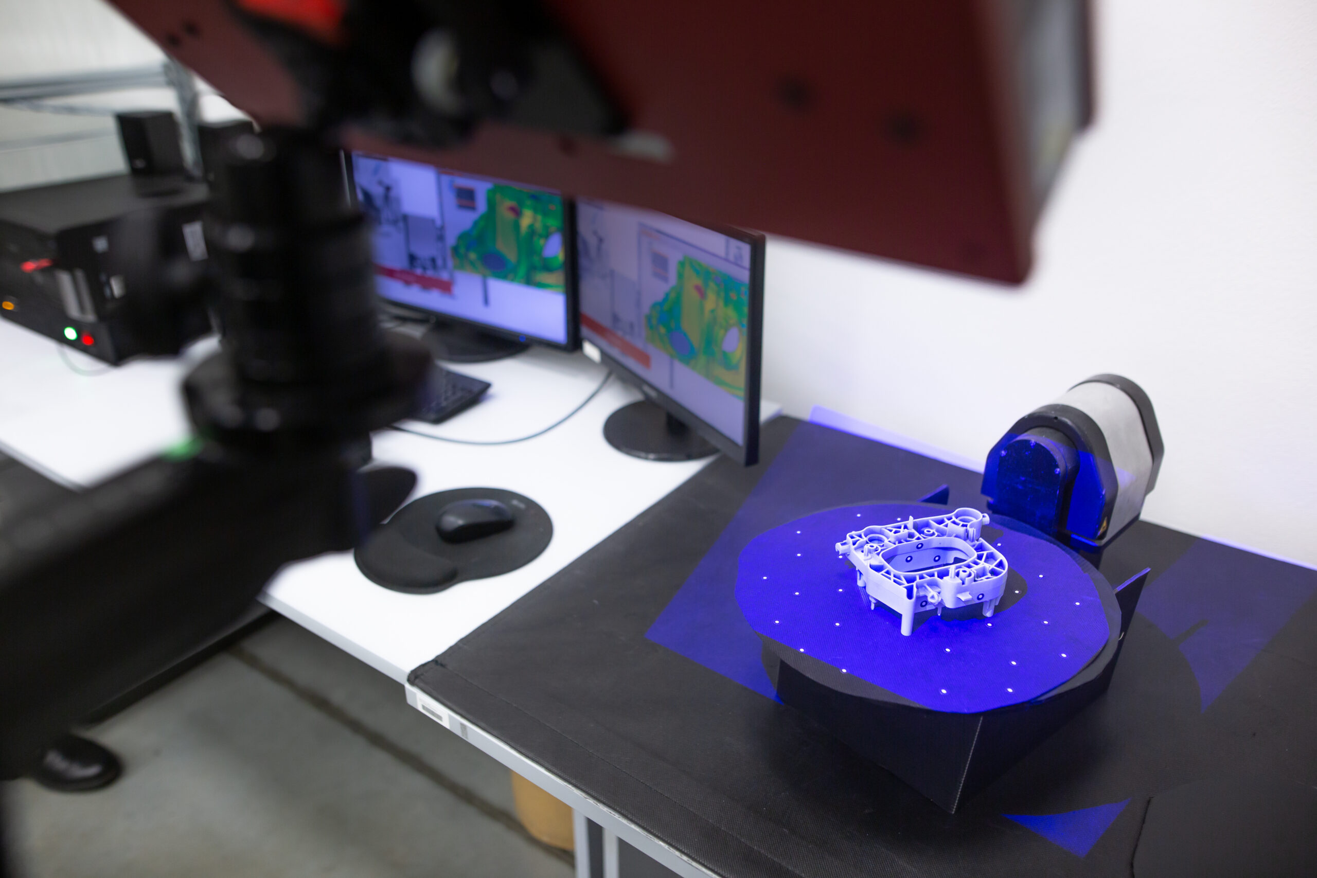 Professional 3D scanner scanning an industrial object plastic molding placed on a turntable metrology concept - Fictiv Reverse engineering with 3D scanning