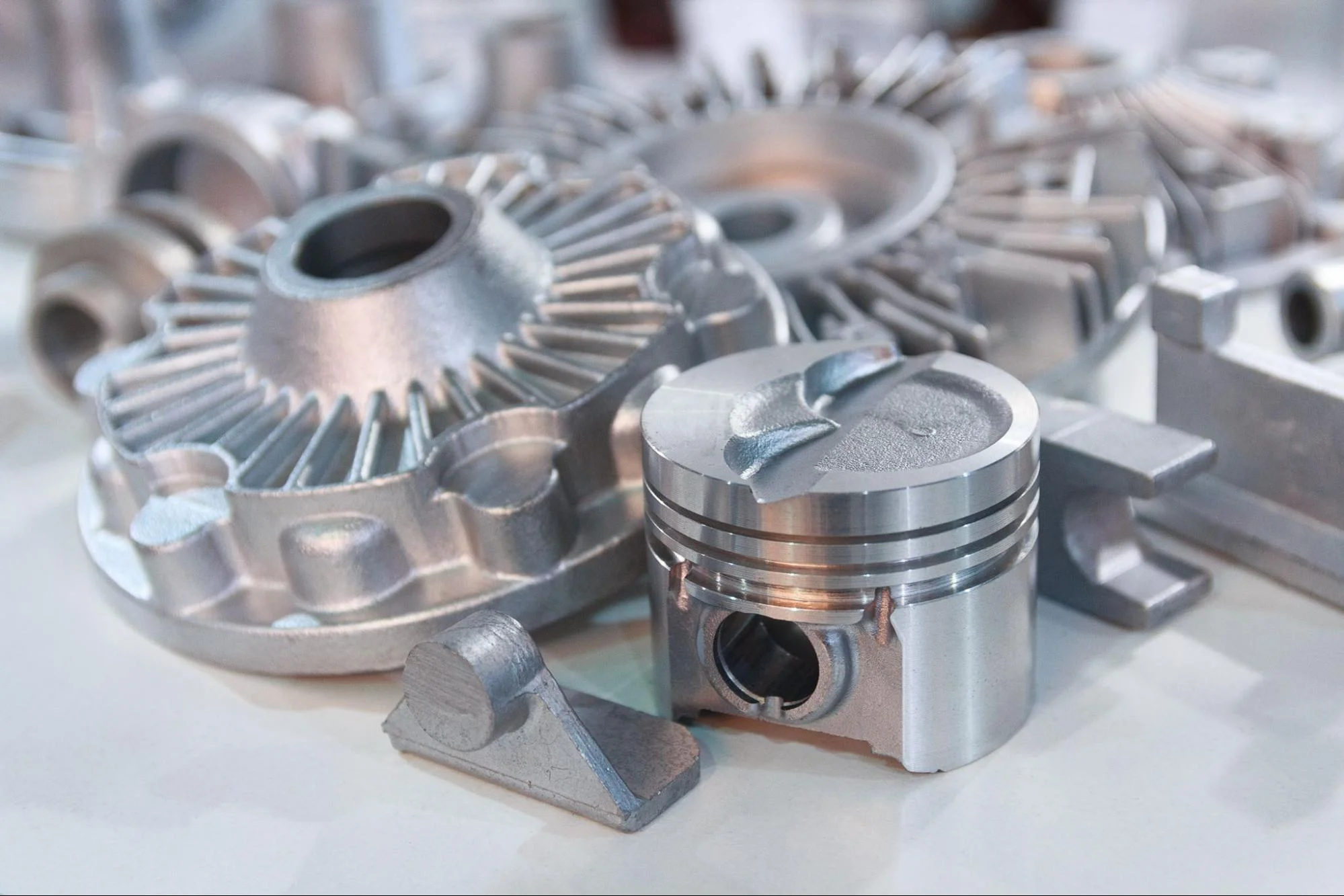 Cast parts with post-machined finish
