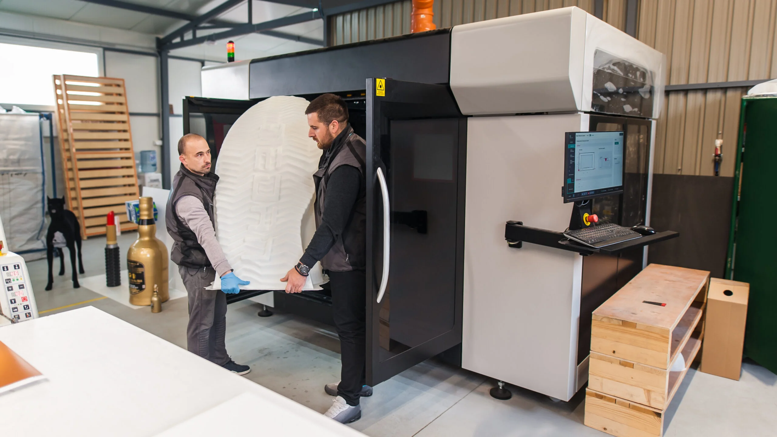 Technicians wear huge 3d model printed on large 3d printer - Fictiv Huge 3D printed part