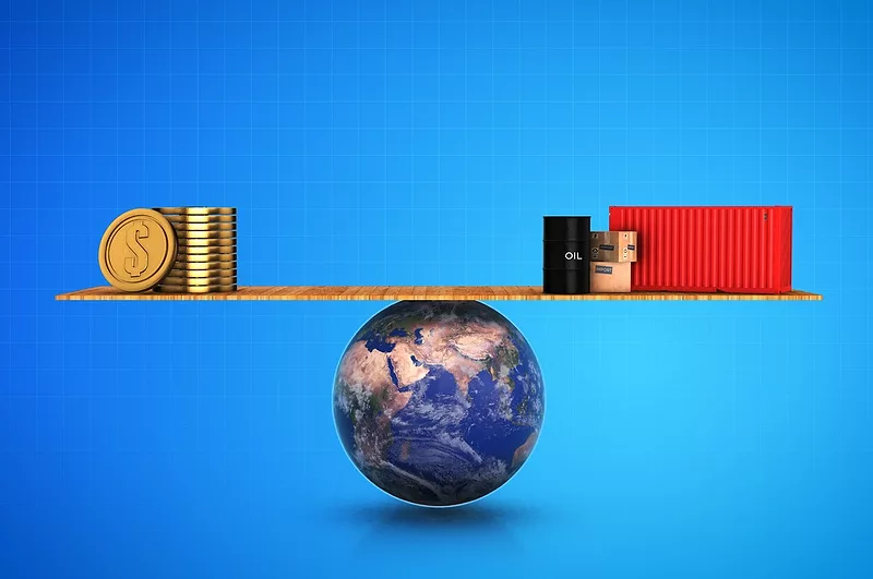 Globe balances a plank with coins on the left and oil and goods on the right, illustrating global energy and commodity balance.