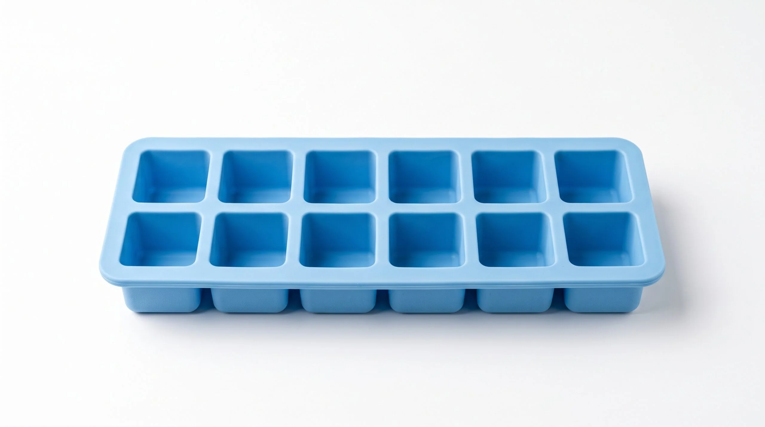 Modern Silicone Ice Cube Tray Isolated on White Background for Kitchen Product Mockup and Household Use - Fictiv Molded food-grade ice cube tray