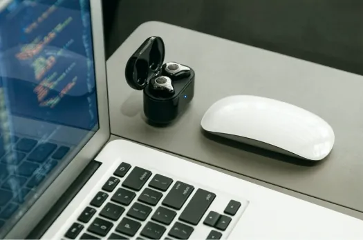 
												Laptop and wireless mouse for the Consumer Electronics industry