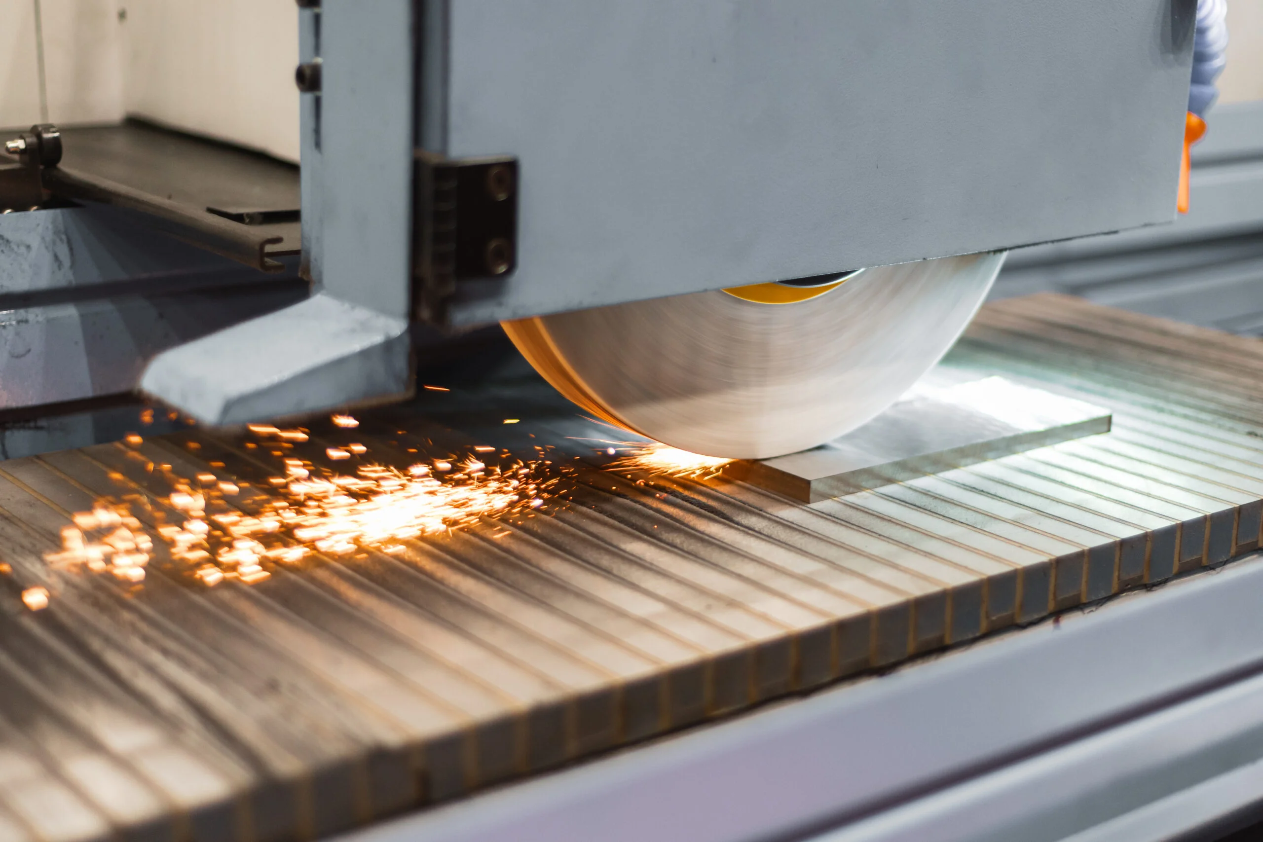 Work of an industrial surface grinding machine Grinding of a flat metal part - Fictiv Surface grinding flat stock material
